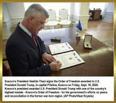 KOSOVO President_PeaceAwardSign1.jpg